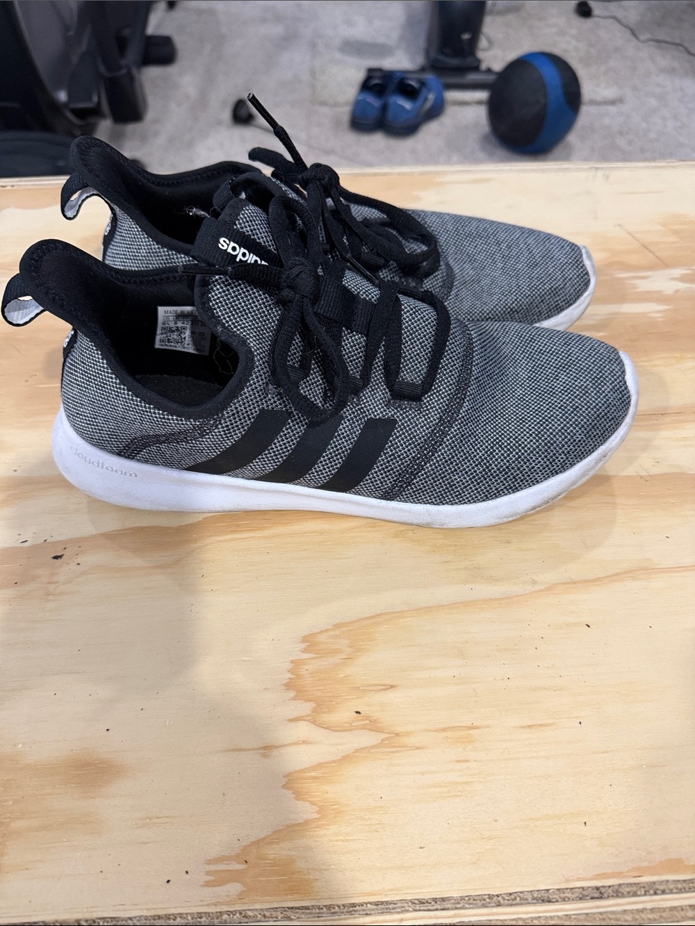adidas women’s Gray Sneakers with Black Stripes
